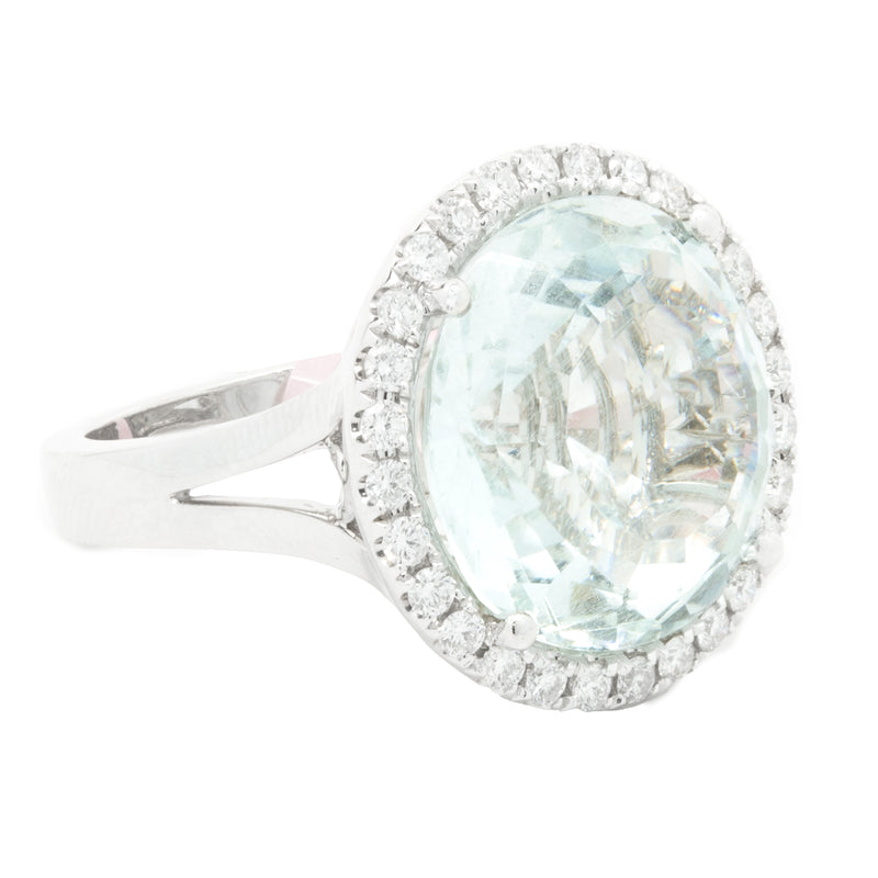 18 Karat White Gold Aquamarine and Diamond Halo Ring