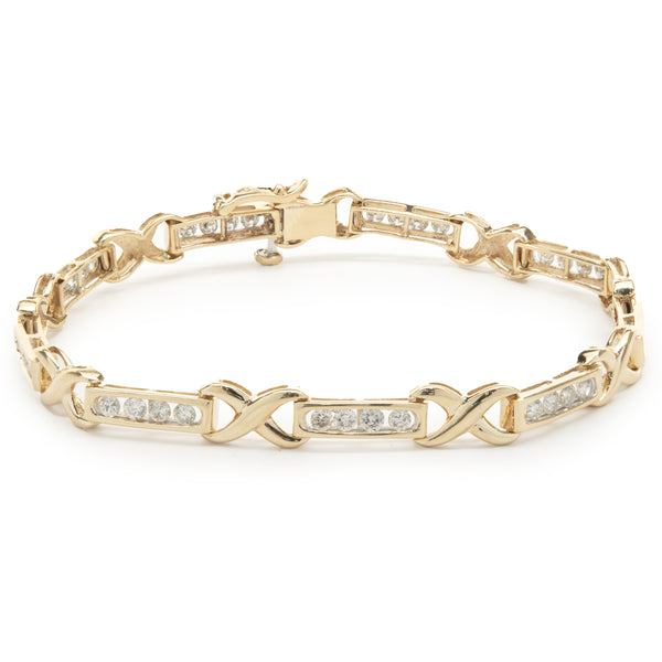 14 Karat Yellow Gold Channel Set Diamond X Tennis Bracelet