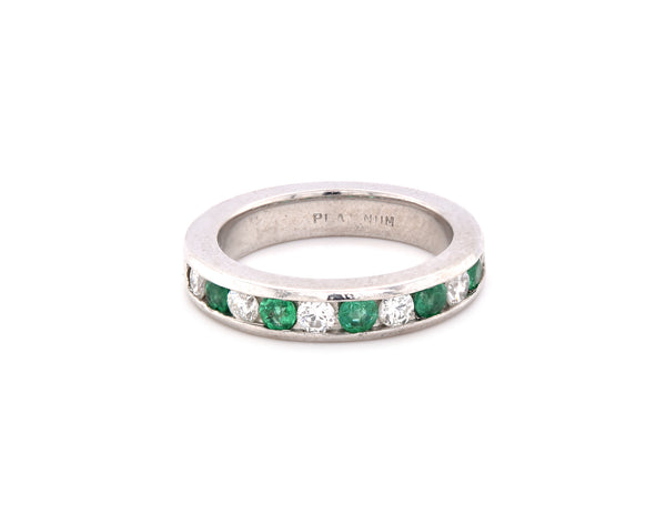 Platinum Channel Set Diamond and Emerald Band