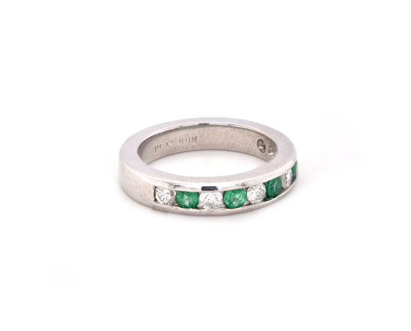 Platinum Channel Set Diamond and Emerald Band